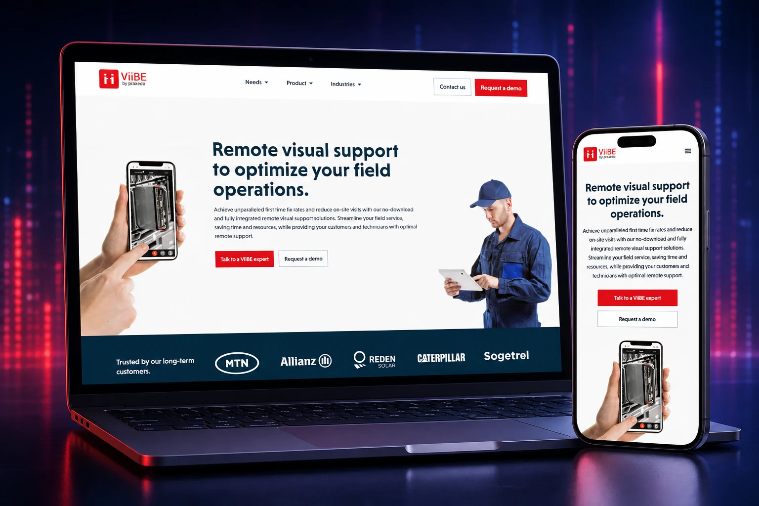 Site ViiBE présenté sur un laptop et un smartphone dans un studio rouge et violet